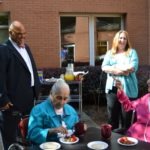 Hamilton Holmes, Jr., visits with residents