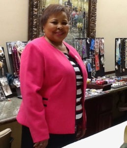 Arletta Brinson with the jewelry she collected for the Jewels for Jewels project at A.G. Rhodes.