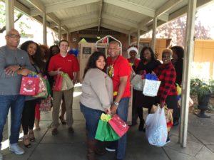 Employees at First Investors Financial Services delivered gifts and visited residents